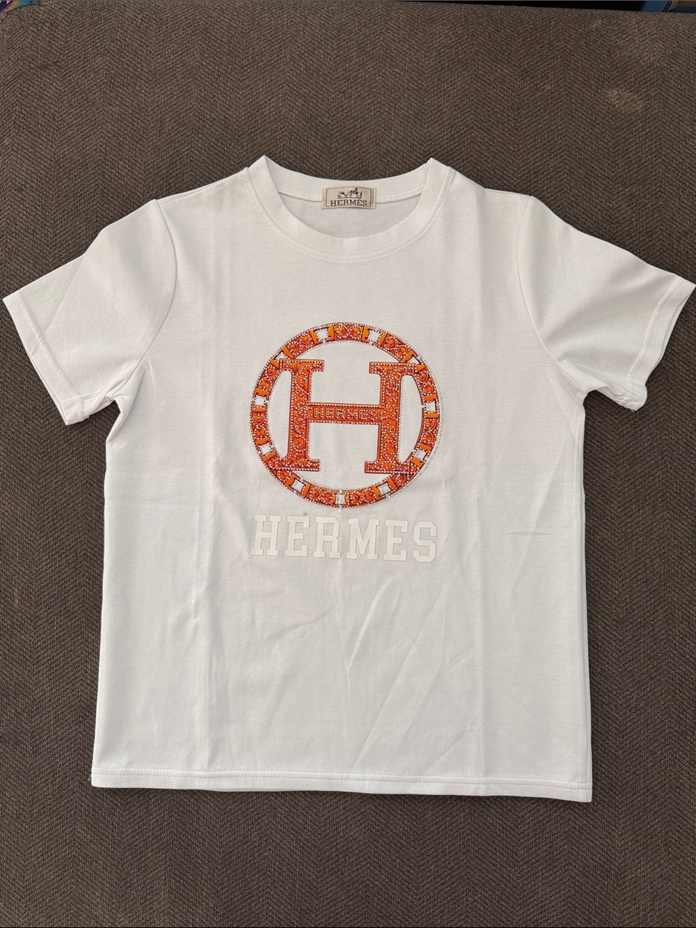 NWOT White Short Sleeve Tee with Orange Logo